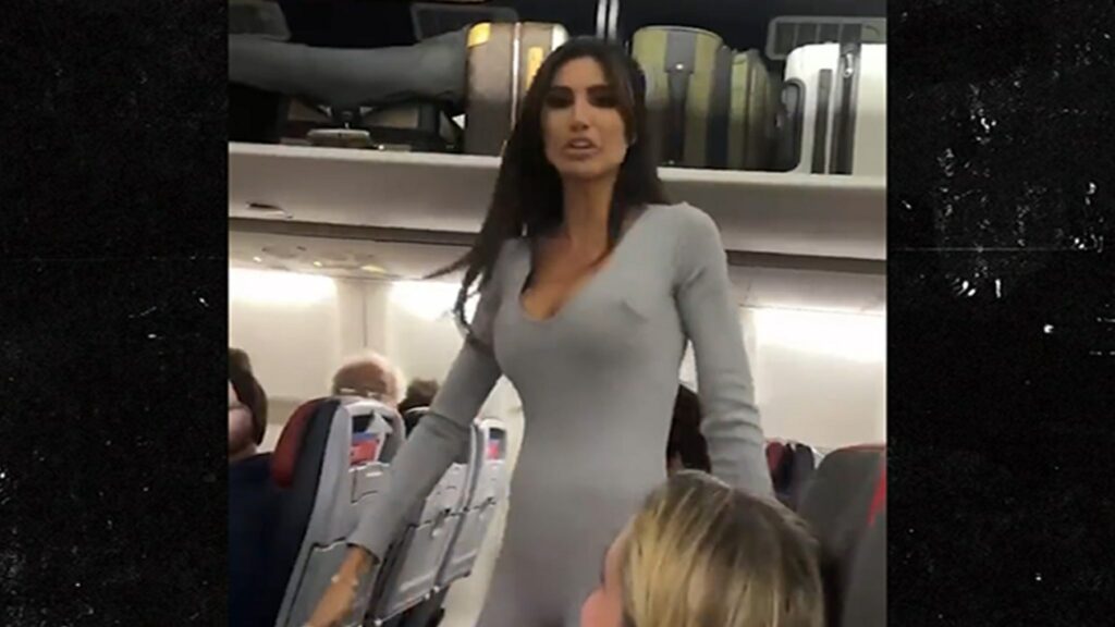 Uma mulher sexy de terno sai do avião e afirma ser famosa no IG