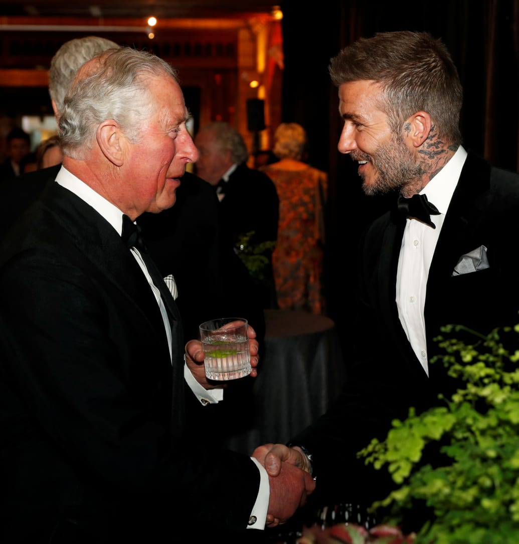 O príncipe Charles da Grã-Bretanha fala com David Beckham durante a estreia mundial da série Netflix "Nosso planeta" No Museu de História Natural de Londres, Grã-Bretanha, 4 de abril de 2019.