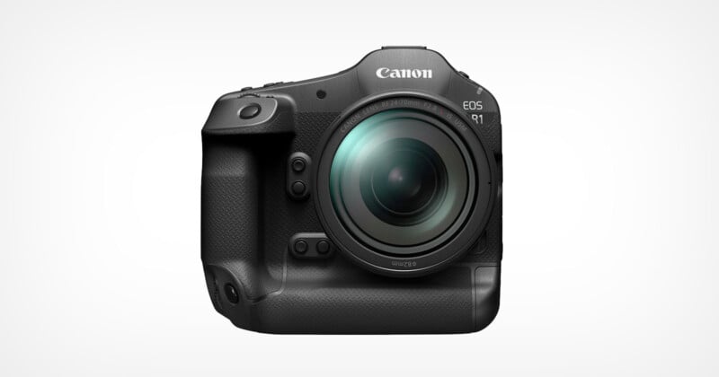 Canon EOS R1 vista de frente contra um fundo branco liso.  A câmera possui uma lente grande e uma alça texturizada no lado esquerdo, com vários botões e controles visíveis em seu corpo.